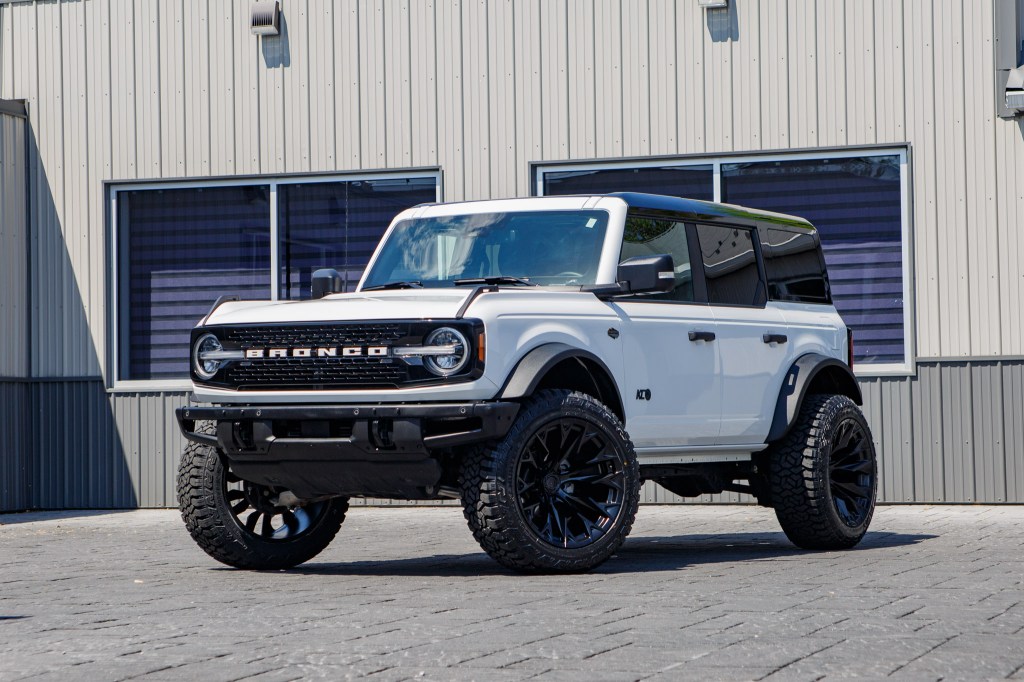 2024 Ford Bronco Wildtrak with a 2.25" Zone lift kit, 22x12 Fuel Flame wheels, and 35" Fury Country Hunter R/T tires. 