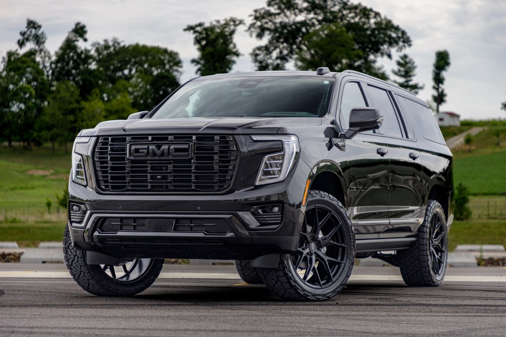 2025 GMC Yukon XL Denali with a 2" Rough Country lift kit, 24x10 Vossen HF64 wheels, and 315/45 Nitto Ridge Grappler tires. Color Match and Vinyl Wrapping performed by Krietz Customs technicians.
