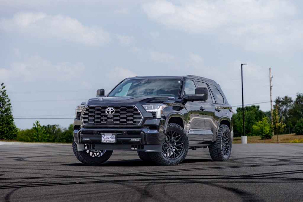 2025 Toyota Sequoia with a 1.75" Rough Country leveling kit, 22x9.5" Vossen HF63 wheels, and 285/55 Toyo Open Country R/T Trail tires.