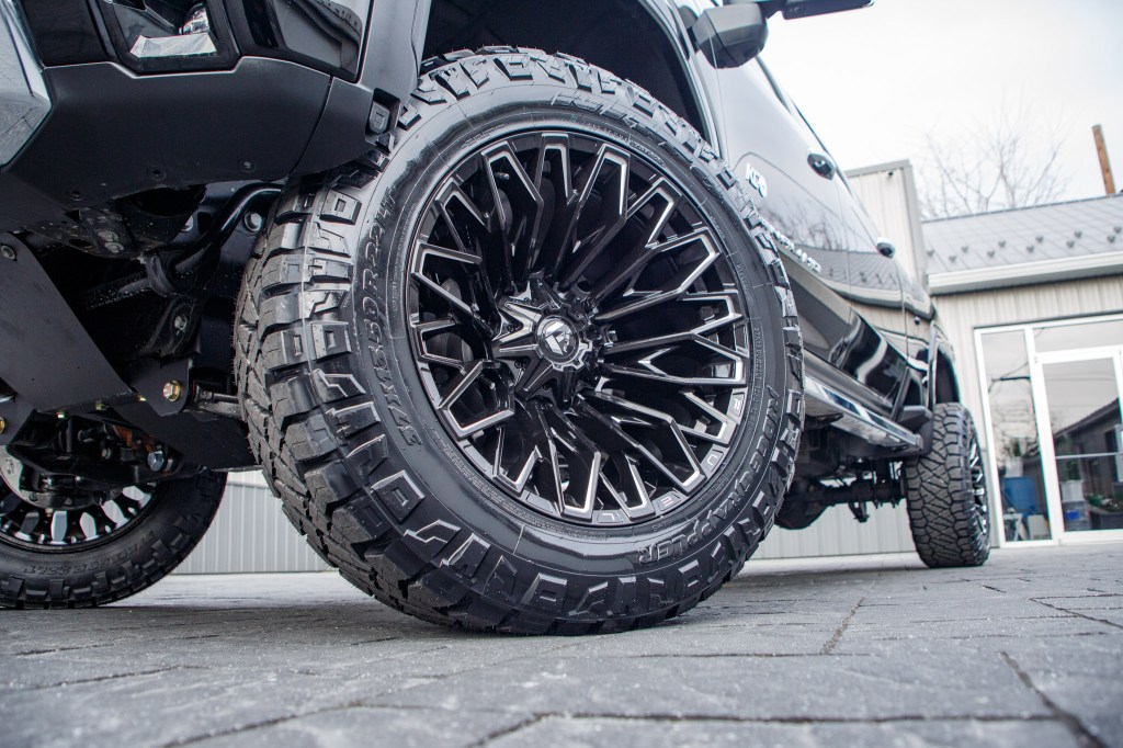 2025 GMC Sierra with 22x12 Fuel Strike wheels and 35" Nitto Ridge Grappler tires. 