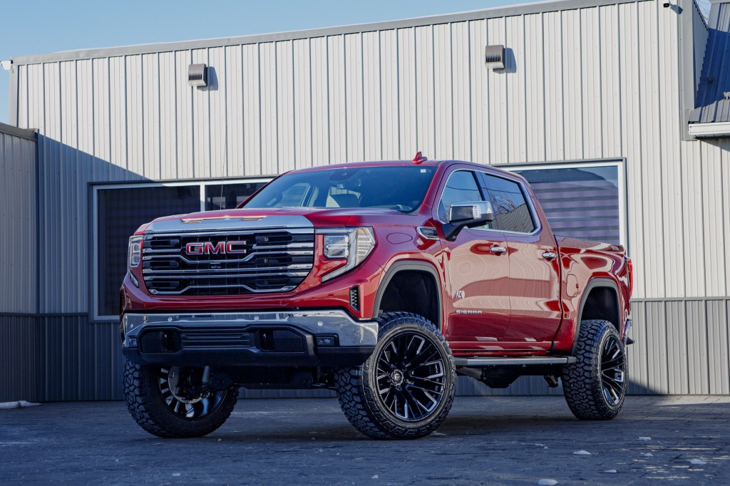 A 2026 GMC Sierra 1500 SLT Texas Edition with a 6" Rough Country lift kit, 22x12 Fuel Rebar wheels, and 35" Fury Country Hunter R/T tires. 
