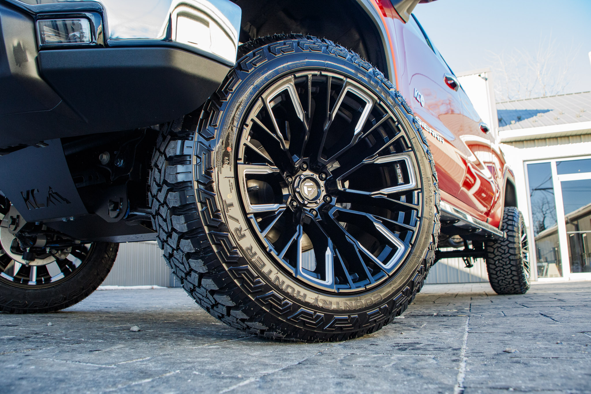Fuel Rebar wheels and 35" Fury Country Hunter R/T tires on a 2026 GMC Sierra 1500 SLT Texas Edition. 