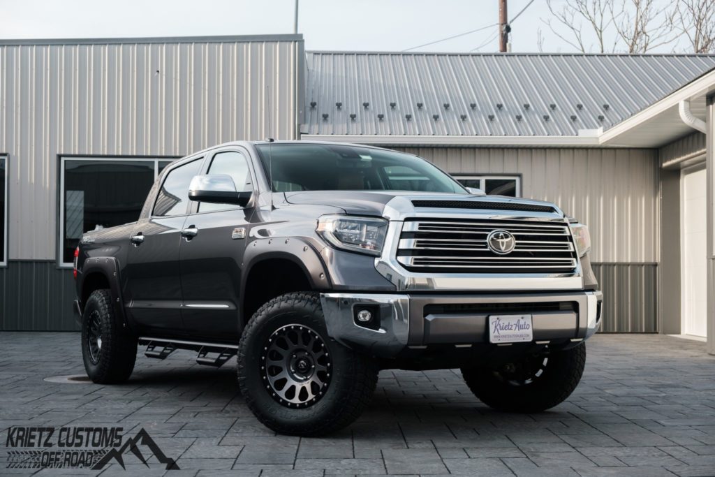This Toyota Tundra is equipped with 22x12 -44 Fuel Reaction wheels, 35125R22 Nitto Ridge Grappler tires, and a 6-inch suspension lift, all customized by Offsets.
