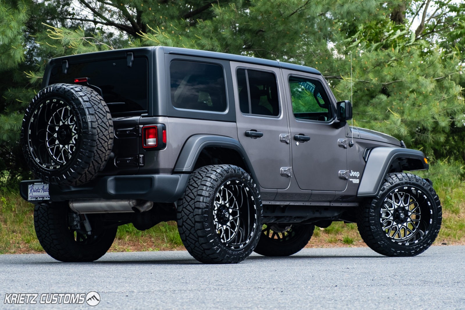 Lifted 2019 Jeep Wrangler with 22×12 TIS 548BM Wheels and