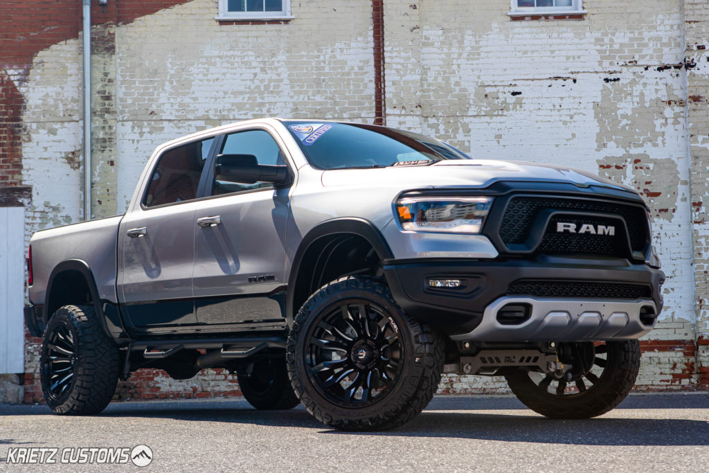 lifted-2019-ram-1500-rebel-with-22-12-fuel-blitz-wheels-and-6-inch