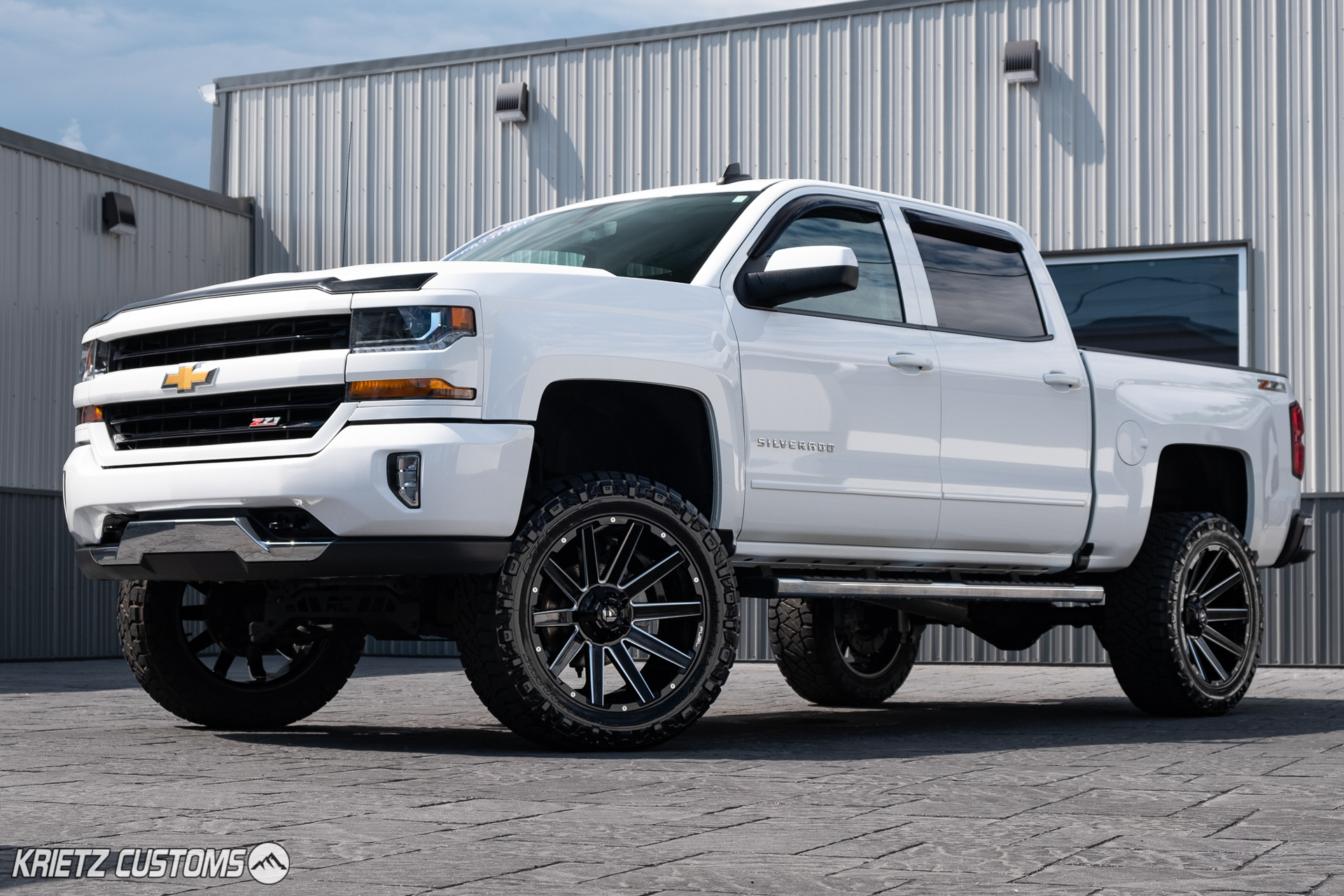 Lifted 2017 Chevrolet Silverado 1500 with 22×10 Fuel Contra Wheels and ...