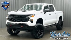 Lifted 2024 Chevrolet Silverado 1500 Custom Trail Boss Short Bed w/ Dark Essentials