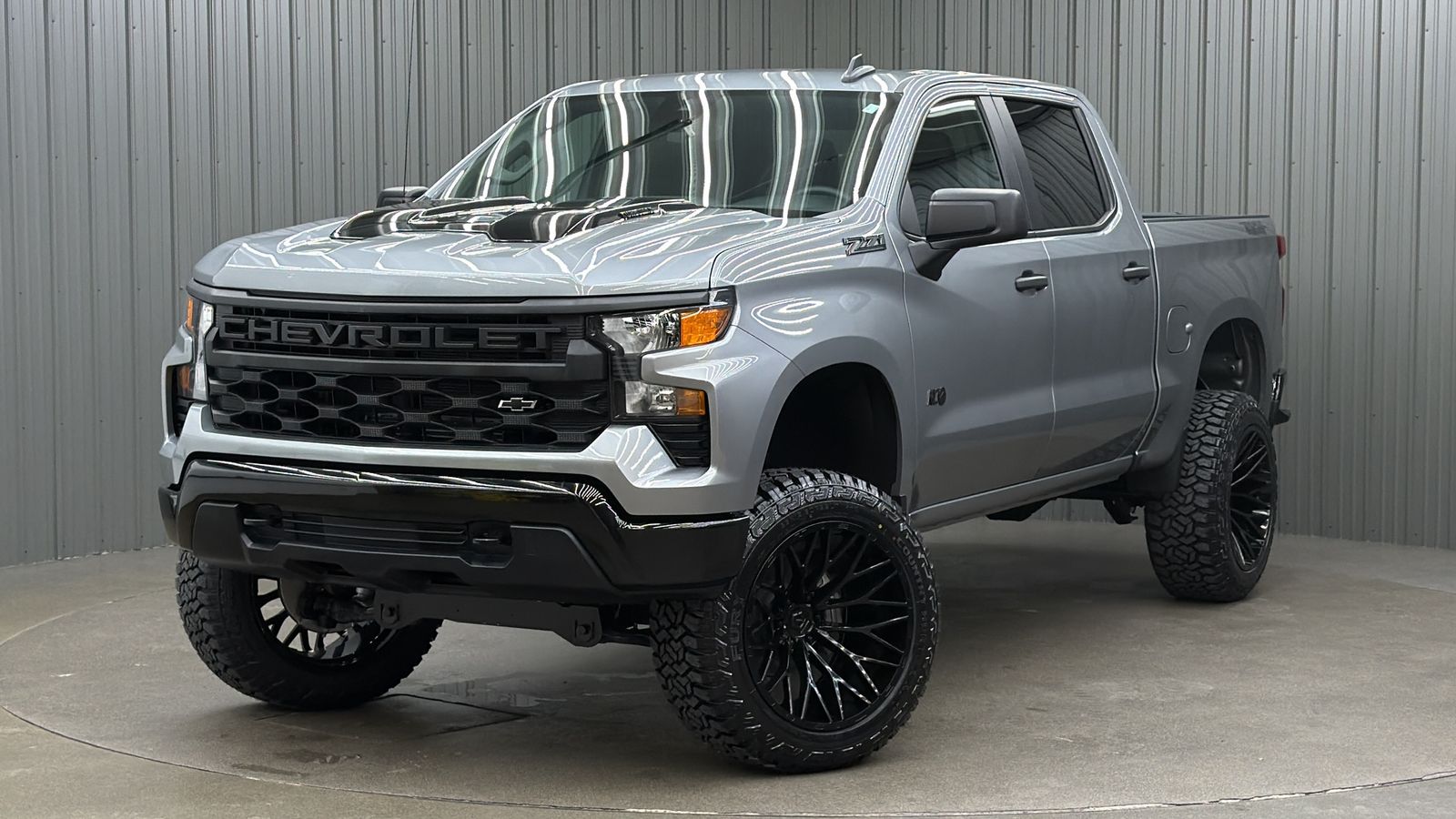 Lifted 2025 Chevrolet Silverado 1500 Custom Trail Boss Short Bed w/ Dark Appearance Pkg