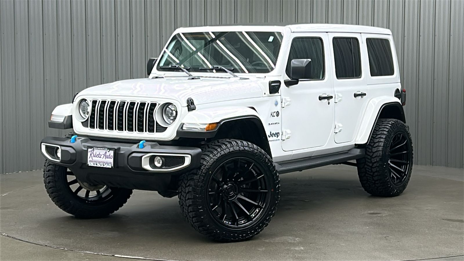 Lifted 2024 Jeep Wrangler Sahara 4xe w/ Tech & Sky Top