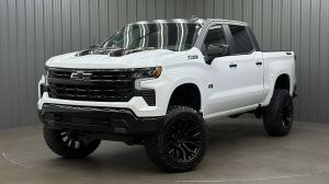 Lifted 2025 Chevrolet Silverado 1500 LT Trail Boss Short Bed w/ Convenience 2 & Dark Essentials